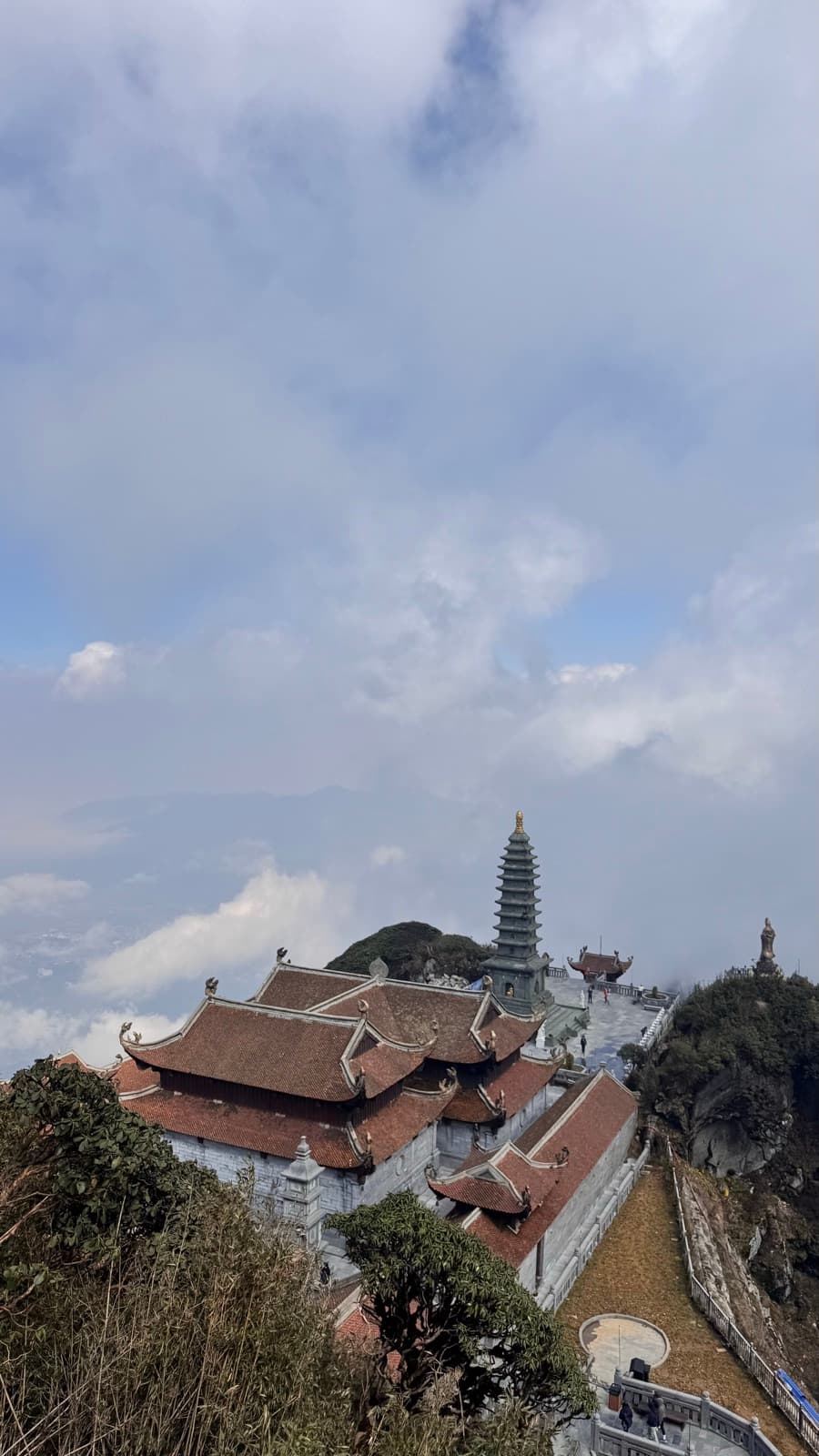 Mountaintop pagoda rising above the clouds on Fansipan