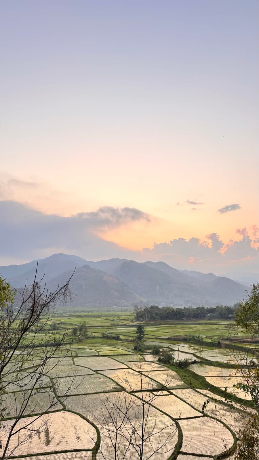 Sunset over flooded rice terraces in the Mai Châu valley
