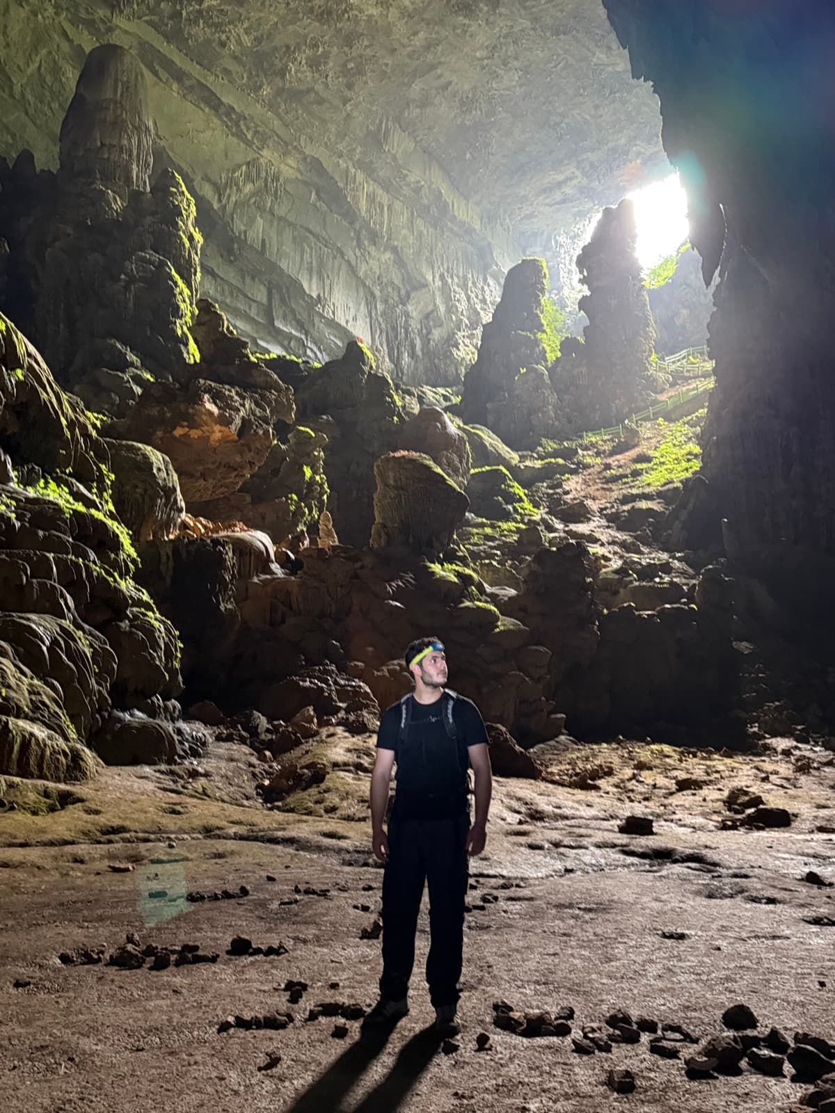 Light pouring into a vast cavern in Pù Luông